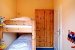 Schlafzimmer mit Etagenbett - Dünenschloss 1-21 - Top-Hundeurlaub