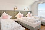 Schlafzimmer - Ferienwohnung Tower of Power Olpenitz - Top-Hundeurlaub