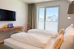 Schlafzimmer - Ferienwohnung Tower of Power Olpenitz - Top-Hundeurlaub