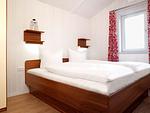 Schlafzimmer - Haus Pacific - Top-Hundeurlaub