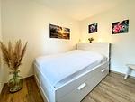Schlafzimmer im EG mit Doppelbett - Haus 37a - Top-Hundeurlaub