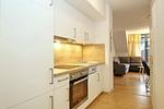 Küchenzeile mit Blick zum Wohnbereich - Wohnung 14-6 - Top-Hundeurlaub