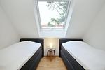 erstes Schlafzimmer mit Einzelbetten - Wohnung 14-6 - Top-Hundeurlaub