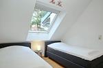 erstes Schlafzimmer mit Einzelbetten - Wohnung 14-6 - Top-Hundeurlaub