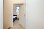 drittes Schlafzimmer mit Boxspringbett - Wohnung 14-6 - Top-Hundeurlaub