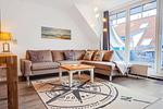 Wohnzimmer mit Sofaecke - Wohnung 04-6 - Top-Hundeurlaub