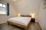 1. Schlafzimmer im 1. OG - Reethaus 03a - Top-Hundeurlaub