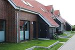 Fassade / Eingang - Ferienreihenhaus "Langeoog" Lale Andersen 2d Galerie "Langeoog" - Top-Hundeurlaub
