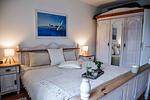 Schlafzimmer - Ferienwohnung Poseidon Residenz Störtebecker - Top-Hundeurlaub
