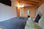 Schlafzimmer - Bernhard - Feriendorf Via Claudia Haus 62 - Top-Hundeurlaub