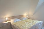 Schlafzimmer - Birkenstraße 11c Haus 2 - Top-Hundeurlaub
