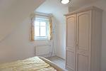 Schlafzimmer - Birkenstraße 11c Haus 2 - Top-Hundeurlaub