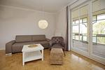 Wohnzimmer mit Sitzgruppe - Wohnung 03 - Top-Hundeurlaub