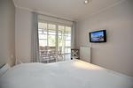 1.Schlafzimmer mit TV - Wohnung 03 - Top-Hundeurlaub