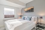 deichlodge, lodge.vier, Schlafzimmer mit Doppelbett - Ferienwohnung deichlodge, lodge.vier - Top-Hundeurlaub