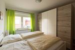 Schlafzimmer - Ferienwohnung Dat Ferienhus Norddeich Whg. 8 - Top-Hundeurlaub