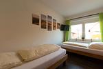 Schlafzimmer - Ferienwohnung Dat Ferienhus Norddeich Whg. 8 - Top-Hundeurlaub