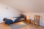 Schlafzimmer - Ferienhaus  Achteck am Deich, Graureiherweg 4a - Top-Hundeurlaub