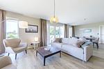 Ferienwohnung Strandidylle Ostseebad Wustrow Wohnzimmer mit gemütlichem Sofa - Strandidylle - Top-Hundeurlaub
