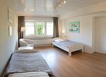 Schlafzimmer - Brise 5 am Wittensee – ebenerdige Ferienwohnung mit Terrasse & Spielscheune - Top-Hundeurlaub