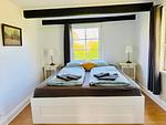 Schlafzimmer mit Doppelbett im Ferienhaus Sommerlycka - Haus Sommerlycka - Top-Hundeurlaub