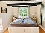 Schlafzimmer mit Doppelbett im Ferienhaus Sommerlycka in Fågelfors - Haus Sommerlycka - Top-Hundeurlaub