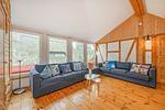 Wohnzimmer - Ferienhaus Rad Kapitän direkt am See mit Sauna und Terrasse - Top-Hundeurlaub