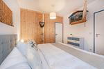 Schlafzimmer - Ferienhaus Rad Kapitän direkt am See mit Sauna und Terrasse - Top-Hundeurlaub