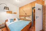 Schlafzimmer - Ferienhaus Rad Kapitän direkt am See mit Sauna und Terrasse - Top-Hundeurlaub