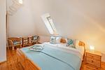 Schlafzimmer - Ferienhaus Rad Kapitän direkt am See mit Sauna und Terrasse - Top-Hundeurlaub