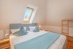 Schlafzimmer - Ferienhaus Rad Kapitän direkt am See mit Sauna und Terrasse - Top-Hundeurlaub