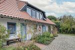 Fassade / Eingang - Ferienhaus Rad Kapitän direkt am See mit Sauna und Terrasse - Top-Hundeurlaub