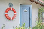 Fassade / Eingang - Ferienhaus Rad Kapitän direkt am See mit Sauna und Terrasse - Top-Hundeurlaub