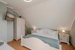 Schlafzimmer - Ferienwohnung Thurbruch mit Sonnenterrasse, ruhig gelegen und perfekt für 4 Personen. - Top-Hundeurlaub