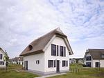 Hauptansicht - Luxus Reetdachvilla mit 3 Schlafzimmern, Sauna und Kamin (G06) - Top-Hundeurlaub