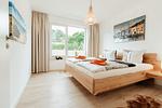 Schlafzimmer - Appartement Kranich - Top-Hundeurlaub