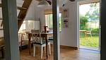 Essbereich mit Blick in den Garten - Chalet Hjortblick - Top-Hundeurlaub