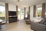 Wohnzimmer - FeWo 18: strandnah, Terrasse - Top-Hundeurlaub