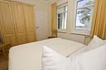 Schlafzimmer - FeWo46: Balkon, Sauna, Schwimmbad - Top-Hundeurlaub