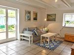 Wohnbereich mit Schlafsofa - Doppelhaushälfte Nr. 2 im Feriengarten - Top-Hundeurlaub