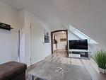 Wohnzimmer - Ferienwohnung Nordwind Neßmersiel - Top-Hundeurlaub