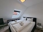 Schlafzimmer - Ferienwohnung Nordwind Neßmersiel - Top-Hundeurlaub