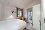 zweites Schlafzimmer mit Sitzgelegenheit - Ferienhaus 02a - Top-Hundeurlaub