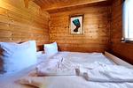Behagliches Schlafzimmer im Erdgeschoss mit bequemem Doppelbett - Ferienwohnung Reimann - Top-Hundeurlaub