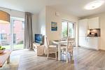 Wohnzimmer - Ferienwohnung Die Ostseer Damp - Top-Hundeurlaub