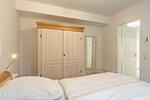 Schlafzimmer - Ferienwohnung Die Ostseer Damp - Top-Hundeurlaub