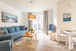 Wohnzimmer - Ferienwohnung Die Ostseer Damp - Top-Hundeurlaub
