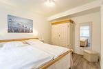 Schlafzimmer - Ferienwohnung Die Ostseer Damp - Top-Hundeurlaub