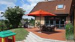 Familienfreundliches Ferienhaus in Pelzerhaken mit Garten, großzügigem Wohnbereich, Kamin und Sauna - "Ocean View" mit Sauna, Kamin und Gartenblick - Top-Hundeurlaub