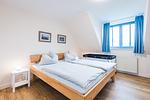 Schlafzimmer - Haus Muschelsucher, Dünenstraße 44, App. 3 - Top-Hundeurlaub